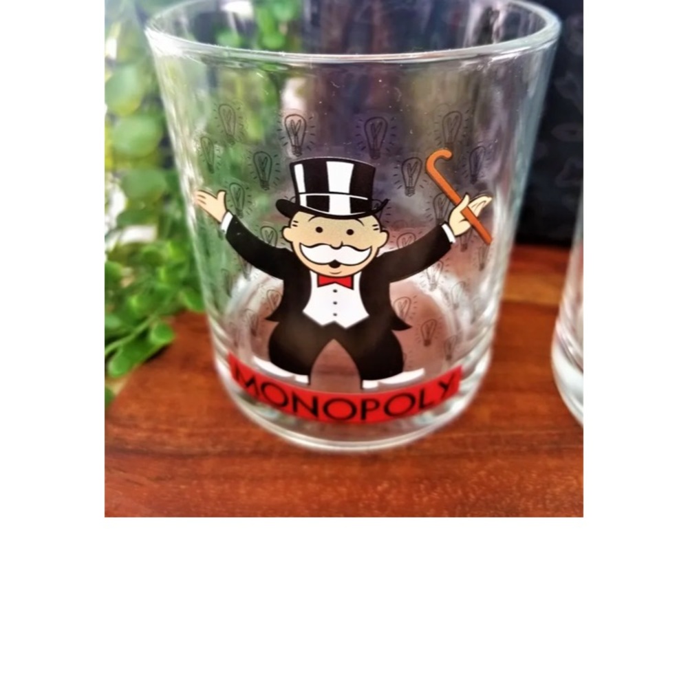 Vintage monopoly man drinking glass